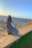 Don't hesitate to purchase this! I'm 5'5, 34B, 145 lbs and ordered a medium. It's so comfortable and perfect for the summer. I wore it in Old San Juan and got so many compliments! - Olivia O.