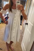 Fits great, sits right below my knee. Has pockets so it does have extra material around the hip area. The material is stiffer than I'd like, I was hoping for something lighter weight. - Tana S.