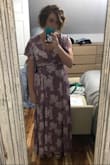First off, I am typically between a medium and large and am glad I ordered the medium. (For size reference, I am 5'8", 158lb.) It fit perfectly and is super flattering that it doesn't drag on the floor like most maxis. The color and print are beautiful and true to the photos. I've only worn it once and got tons of compliments. One thing that bothers me is I wish it had a snap closure along the neckline. But overall worth it and will consider buying in another color/print! - Jennie G.