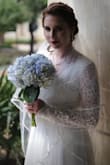 I bought this for my laidback, budget wedding. I had to get it hemmed, since it is pretty long, but other than that, it fits GREAT! It looks fantastic in my bridal portraits and I can't wait to wear it to my wedding in July! - Rachael V.