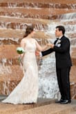 The length and fit was perfect. A little snug through thighs but was as it should be for a mermaid style. The beige lining and material was nice and cool for our May humid wedding in Texas. Photographs beautifully! - Kristin M.