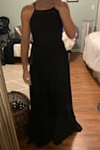 The dress is slightly long on me, but nothing a pair of heels can't fix. The straps down the back took a few minutes to get on and the help of someone else to adjust, but once on, the dress is beautiful. - Kaley R.