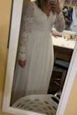 I was shuffling to find a dress for my beach wedding. I was worried that it wouldn't fit or be good quality.. THIS DRESS IS PERFECT. It's so beautiful. True to size. The material is very good quality. - Emily L.