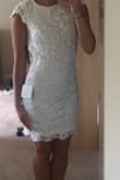 I bought this dress for my engagement party. It's amazing. Modest in the front and sexy in the back. Fit flawlessly. I love it! Just need to clean up some tan lines.. - BRITTANY C.