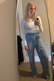I felt flashy but comfortable wearing these pants to a midweek dinner with the boyfriend. He loved how they looked on me. They're loose but still flattering! They're a little heavy so I don't think I could wear them in the summer heat, but moderate to cool weather would be perfect. They're long, so heels are a must or tailoring them up a little! - Amelia L.