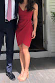 Such a great dress!! The ruching makes it really flattering. I'm shorter so dresses can sometimes be an awkward length on me, but this one was perfect. It's also very comfortable. The only unexpected things about this dress are -- it was a bit tight in the butt (definitely need seamless underwear) and the "rust red" color is much less orange than it is more of a true red. Neither of these things were problems... just unexpected! - Crysti T.