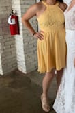 Bought for a wedding, loved the bright color and the fit! Neckline was different than others I've worn, but I was happy that I could wear a strapless bra with this dress no problem! - Danielle D.
