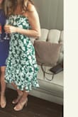 Runs just a tad large but is super cute and flattering! - Megan A.