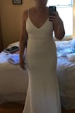 This dress gives an excellent coke bottle shape! Photos don't do it justice. I'm pretty small chested for my size, so I definitely don't need a bra (but I could wear a strapless one). I have an amazing ball gown for my wedding, but I really wanted something to feel sexy and fun in for the reception. This dress fits the bill. I definitely have some lumps, so I will be wearing shapewear, but the dress is well lined and I'm not worried about it showing. Love this dress! - Lillian J.