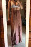 This maxi skirt is so nice! The color is a little darker then I thought it was going to be but I still love it! I am short so it is a little long on me even with heels but I will just hem it so that's no big deal. The slits on the sides make me look taller then I am which I love! 10/10 recommend! I paired it with a Lulus black crop top that I LOVE! - Alivia C.