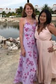 Loved wearing this dress to a wedding down south. Very good quality and it fit nice and snug around the waist up. I'm 6' tall and without heals it was just touching the ground, so you will most likely have to get it tailored if you're any shorter than 5'10". I highly recommend this dress! - Alia C.