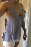 Love the look and feel of this. Because of the tie in the back, this fits pretty good. But the fabric is loose in the front by the armpit/bust area and lays funny. Maybe if the straps were shorter it wouldn't have this problem? Or perhaps the cut is off. - Cheri S.