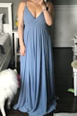 I received the dress today and tried it on immediately. The dress is comfortable and the fit was great (5'2", 126lbs, 34D). The only downside is that the dress is too long, so I will need to get it hemmed on the bottom. - Nora C.