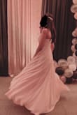 It fit perfectly but runs extremely long, needed to hem the dress quite a bit. The material felt very expensive and looked really good, I got the princess flare I wanted!
Got the dress shipped to Canada and the duty cost way too much, the website gave the impression I wouldn't have to pay for duty. - Dhruvi P.