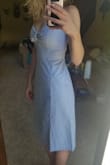 I really liked this dress as it came.  However, being 5'8, it hit at just the wrong spot so I took the length up just about 2 inches. I also couldn't help but think about how cute it would be as a halter dress, so I also had the straps altered to tie behind my neck. I LOVE IT. 

my bust measures a 30DD, or 35" around the fullest part, this is the largest I would recommend for the XS (the zipper is snug but not too binding). 

First pic is before alterations, second is after. - Sarah B.