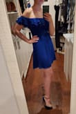 This dress is really great, light and airy, feminine and sweet and just simple and understated. It's very beautiful without trying too hard. It is chiffon material with lining. There isn't a lot of give but I ordered my usual Lulus size, S, and it fits perfectly. It even allows for a meal without giving me an obvious tummy. the shoulder parts aren't so tight that they move up when I lift my arms and it has that silicon no-slip strip all the way around. I will be wearing this with my tan and cobalt blue Jimmy Choos to a wedding. The color is almost perfectly matched to my shoes. - Annastasia R.