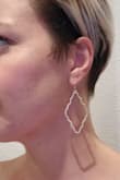 These are a matte-finish gold which I love and they aren't over the top. My new favorites. - Annastasia R.