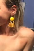 I am so obsessed with these as a statement piece. They are much lighter than expected- I wore them to a wedding and danced all night and didn't notice them in. They are a fabulous pop to any outfit. - Jennifer J.