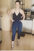 This is a great romper for my tall friends out there. At 5'10" size 6 (volleyball build), the entire fit is more taunt through the torso down to the just below the calf; the ankles won't puff as pictured. This may be tight for those over 5'10 or those with larger busts. Moveable, sittable and the self-tie neck affords a bit more length in the torso compared to fixed, short straps. I was about to give up hope on this trend, but this is one of only 2 rompers that have fit close to intended! Forgive my gym hair and slouchy pose - Love! - Michelle M.