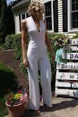 This jumpsuit absolutely rules. I have a hard time finding jumpsuits that aren't too short in the torso and the legs, and this fit perfectly! The fabric is stretchy and definitely formfitting, but the lining is thick and the bodice is structured so it falls just right. The white isn't see through at all. I wore it for my bridal shower and got so many compliments! Tall girls, rejoice and get this jumpsuit! - Dana G.