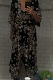Wayyyyy to big and long. I believe the model they used has to be at least 6ft fall. I am 5'5" and these drag on the ground! Also it does not look well on small chested women.... looks more like a robe! - Giang D.