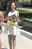 This dress was perfect for my college graduation. It was thick material so it was not see through at all. It was comfortable and did not need any adjustments even when wearing it literally all day long. The only reasons I'm not giving it 5 stars is because it felt a little snug on the top, and if I didn't have the strings double knotted in the back it would come untied because of the material used for them. Otherwise, I loved it! - Kara S.