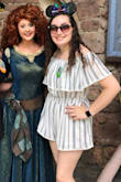 I wore this while spending a day walking around Disney World and was comfortable all day long. It didn't really need much adjusting throughout the day. Every so often the shoulders would pop back up, but that's simple to just put back into place. It wasn't too short but also not awkwardly long. Loved it! - Kara S.