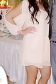 Dress was super cute. Wore it to a wedding. Dress was looser then expected. Usually wear a size small but would probably get an extra small as it would fit better - Joan R.