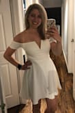 This dress is so beautiful. The material is stretchy but very flattering. I can't wait to wear for my bridal shower. - Marie K.