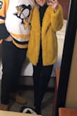 I love this coat, it is so cozy! I wore it to a pens game up in Pittsburgh and everyone loved it! It's really warm too. I can't wait for cold weather to wear it again! I usually size up for coats but this one fit perfectly in my normal shirt size. - Sierra H.