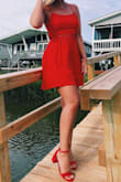 It's a little short, but I really like it. The straps make it very adjustable which I like, just have to be careful with that beach wind! - Sierra H.