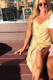 Super comfy, light n airy, cute lil tie up back...summer fab! Washes and drys nice, can be dressed up or dressed down. Want every color lol - Molline B.