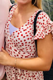 The dress was way more low cut than shown in the pic. I love it but you'll like have to wear a cami with it or use a safety pin. Overall though I really like the dress - flattering fit and length and comfortable material. - Mackenzie M.