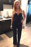 I love this jumpsuit because it fits perfectly!!! I always have a problem with pants not being long enough but not with this jumpsuit. It's the perfect length!!! Buy it! You won't be disappointed!!! - Lindsay G.