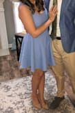 I wore this dress to a wedding in Charlotte, NC in near 90 degree weather, but I felt wonderful the entire time! The fabric is light enough to not feel weighed down, and I didnt feel like it was soaked with sweat at all (and it was seriously hot!)
The Lulus picture is a pretty good indication of the color, but it's just a bit more purple-y in person. It was perfect for matching my boyfriend's suit jacket and everybody complimented us all night long!
Usually I have an issue with dresses pinching my back/arms or showing too much chest, but this was perfect (a wonderful length too) for someone a bit on the shorter side! It even worked with my every day bra! - Erin L.