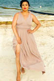 I wore this to my brother's beach destination wedding, and it was perfect. I am curvy and have a thicker lower body. This looked good and fit well. I did not wear a bra with it just bought one of those sticky covers.
I got size XL.
Usually I wear L-XL. - Dena M.