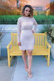 This dress is beautiful and comfortable! I would say true to size.. but I am always reading all reviews when I like a dress and if it says runs big I get a Medium and when it says run Small I get a Large LOL. Not the typical review you are waiting for but that's how I find my perfect size! - Paula C.
