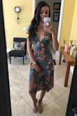 This dress fit well and is adorable. The front is low and I am not able to wear a bra with this, I would think if I had a larger bust size this might make it more challenging to wear. - Kayla P.