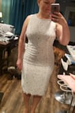 I'm in love with this dress and cant wait to wear it for our rustic themed reception in 10 days. I exchanged the large for a medium and it fits like a glove, highlighting the curves I been working on! I only wish the color was closer to what's on the model (or if there was an option for all white), instead the lace is ivory over beige material and looks nothing like the pics (there was another dress I ordered from Lulus and had the same issue). - Yuliya B.