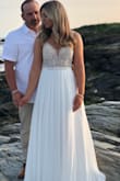 This dress absolutely exceeded my expectations. The material was thick and the quality was wonderful. The waistline of the dress fit perfectly, but the back was a bit big initially. A few minor alterations and the dress wore flawlessly. I wore this for my one year wedding anniversary photo shoot, and it was a show stopper. I highly recommend this dress, because you will not regret it! - Carleigh C.
