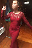 This dress is pretty great! The material is really warm. The arms are a little restrictive (I can't raise them much above shoulder height). I ended up purchasing a medium, and it feels slightly too big (a little pouchy if I move around). If I were a more enthusiastic purchaser of things I would order the small to compare. - Nikiah C.
