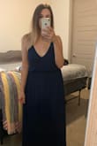 I ordered this in navy for a beach wedding in attending in Hawaii. The fabric is more cloth than I expected but I love the fit. I'm usually between a medium and a large in Lulus dresses and I wanted this to be loose and flowy so I sized up! The elastic band is really comfortable which I think makes this dress great for a lot of body types - Samantha S.
