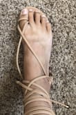 I wear a size 11 so it is always difficult to find really cute shoes that fit. These fit great and are surprisingly comfortable. I do have to wrap the strap through the straps that cross over the feet before wrapping them around my ankles to make them more secure over my foot but I have really skinny feet so not sure if that is why or if they are made too loose? But they still look really cute and fit well when I do that so no big deal for me! I love these! *The first picture shows how loose they are when wrapped the correct way, the second picture shows how they are when I wrap the strap through them. They still look great and fit securely when I do that* (ignore my nasty toenails lol!) - Destiny W.