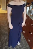 Amazing quality. Nice thick fabric. Perfect Navy Blue. I wore this dress for a formal company banquet. The off the shoulder sleeve thingys stayed put and did not slip or even move.. I will purchase all my dresses from Lulus. The quality, fit, and price is awesome!! - Bridget G.
