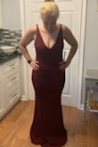 I bought this dress and another one for an upcoming wedding. I didn't keep this one because it was a little too low cut for my liking. However when I tried it on it fit perfect and I loved the color. It was pretty long so had I kept it I would've needed to get it hemmed. - Stephanie L.