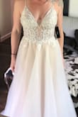 This dress is really pretty. I am not sure how I feel about it on me however. I think I need to take in the chest to make it a bit tighter. It doesn't fit "just right" as you can see in the pics. I think if I take it in a bit it will fit better.
When the dress arrived, as soon as I took it out of the box, lots of rhinestones fell off. Be aware, you will probably have to glue back on a lot of rhinestones. You can see in the pic, all of the black dots are missing rhinestones.
I contacted Lulus and they were great about it, offered a discount on the dress. I'll just have to do a lot of gluing. - Tracey Z.