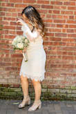 I was looking for a dress for my civil ceremony. I originally ordered two dresses, but as soon as I put this one on I knew it was perfect. Loved the quality of the dress. The sleeves were a bit long for my short arms, but i took it to the cleaners to take 2 inches off. I read the reviews and based on weight and size decided for the Medium. The dress was not fitted but I loved that I was able to move comfortably in it. Overall this dress was perfect for my small ceremony. - Nube C.