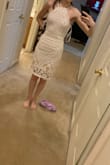 Let me start off by saying that this dress is absolutely gorgeous in person. The lace is beautiful and it is obviously very well-made. Howeverrr, it's just not for me. The nude lining appears pinker/more blush in person, which ended up clashing with my skin tone. I also thought the dress ran a little large. I'm pulling the material to the back some in the picture to achieve a more fitted look. I usually have to get my dresses altered and was expecting this, but it's something to keep in mind when ordering. - Haley L.