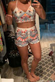 I seriously love these shorts. Fits perfectly. I wear it with the matching top or a different tank. - Ceren I.