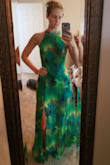 This dress is so flattering! I have a smaller chest, but the small fits perfectly. I can just wear pasties and no bra. Easy to move in as there is little give in the waist. I ordered a medium and it could've worked, but the top was a bit big for my 34A chest and the small fit better in the waist. Covers mostly but with a sexy back. I'll be wearing this to a wedding in Jamaica. Also, best part is that I don't need a slip. It has a lining! (A smidge long in the front but will be wearing heels). - Karissa H.